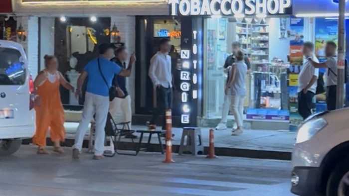 Sokak ortasında tehdit: “Senin kafanı keserim”
